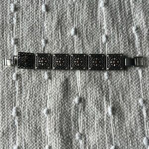 Brighton bracelet. Silver and orange/cream.